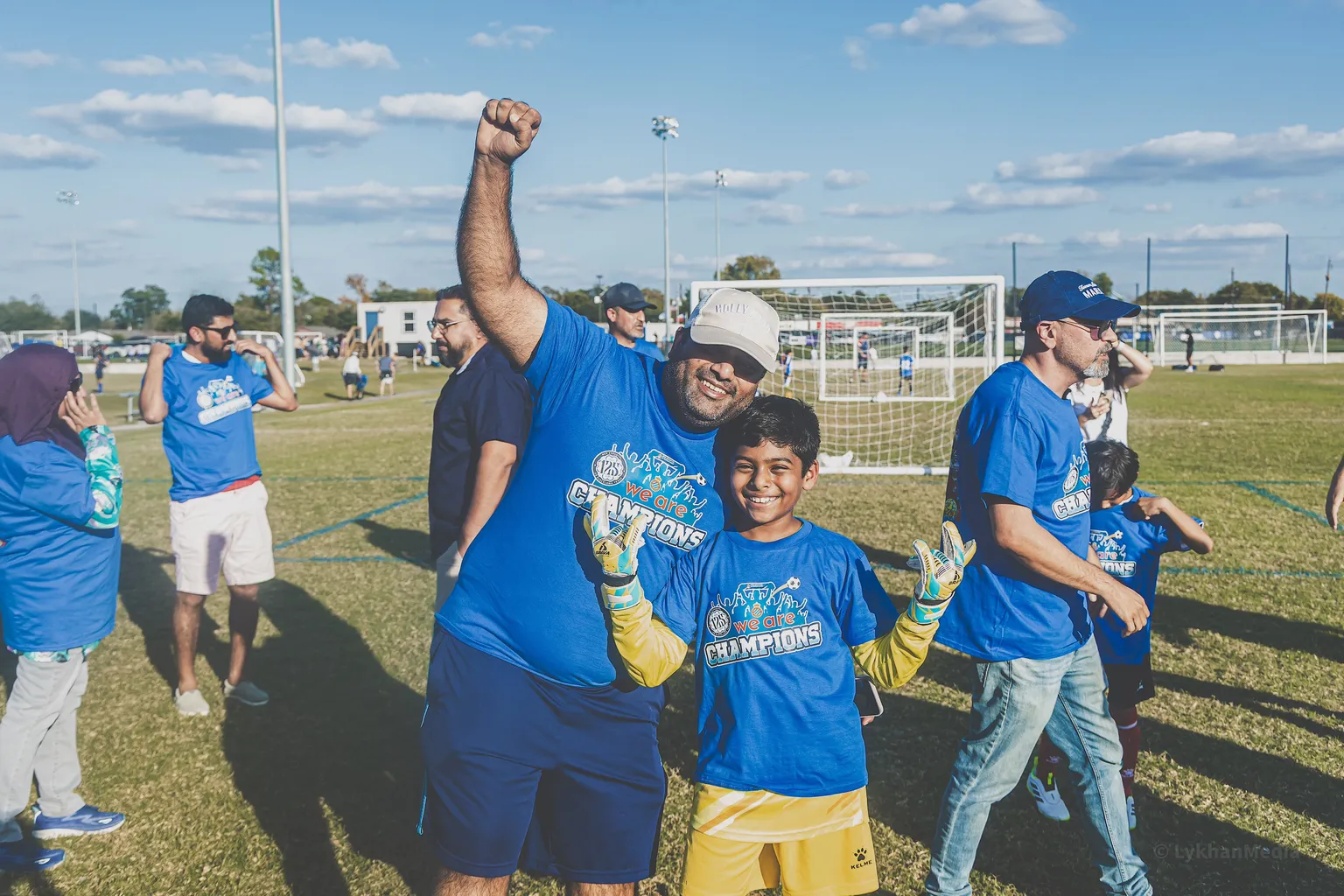 Father and son celebrating championship win