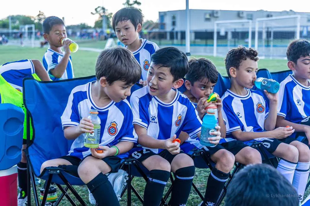 Players hydrating on the sideline