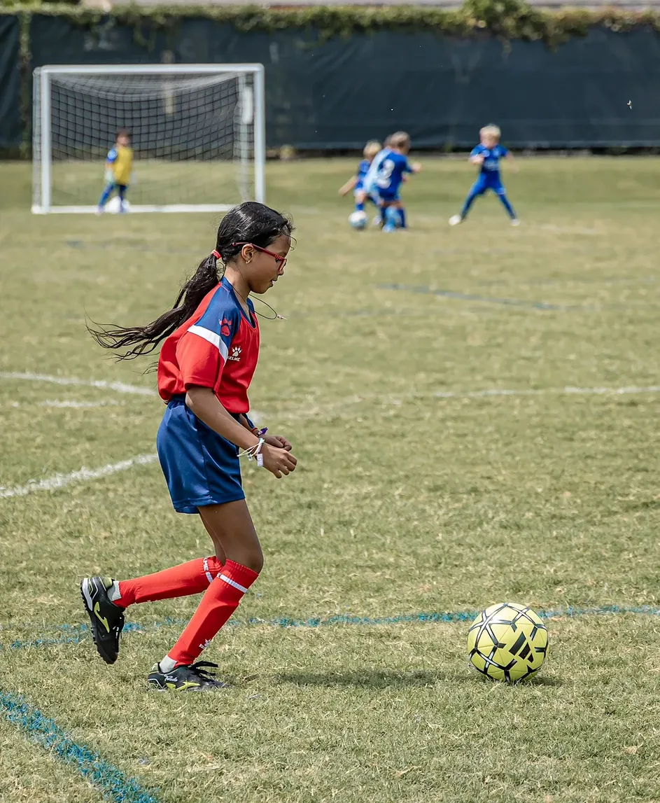 Girl preparing to strike the ball